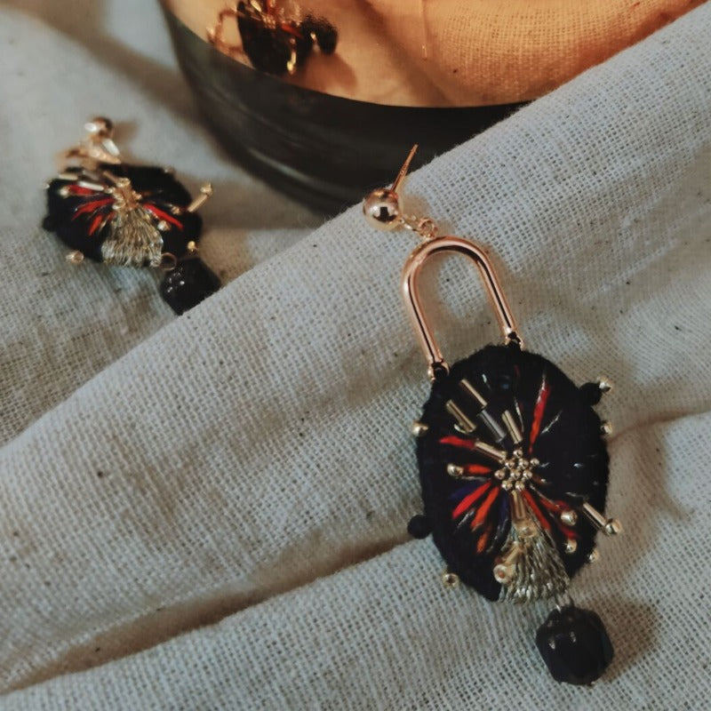 black embroidered earrings