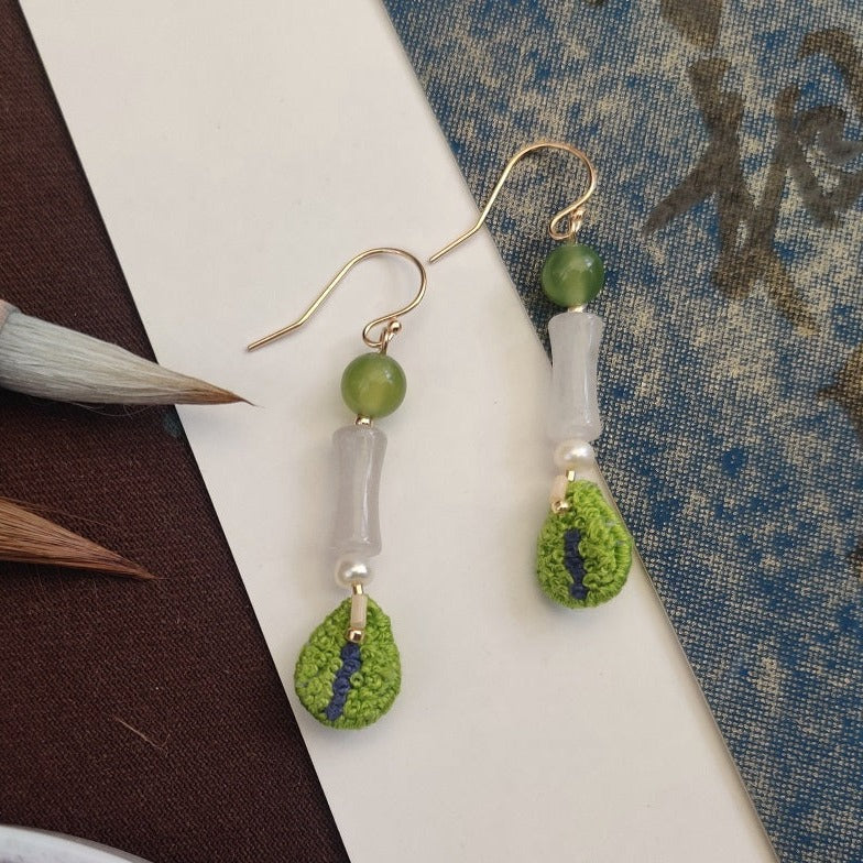 green embroidered earrings