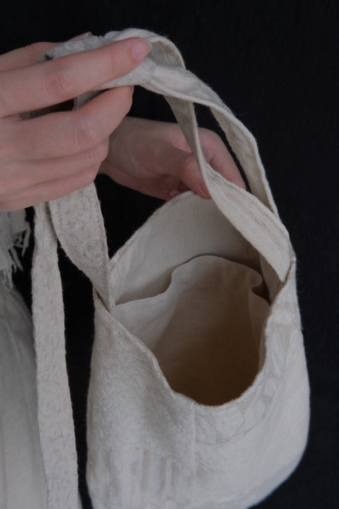 white cloth bag